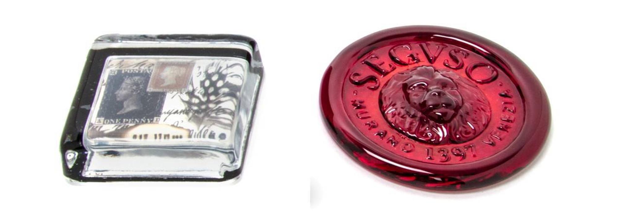 Two Glass Paperweights Diameter of larger 3 3/4 inches.