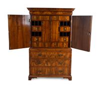 A George III Style Figured Walnut Linen Press — 19TH CENTURY