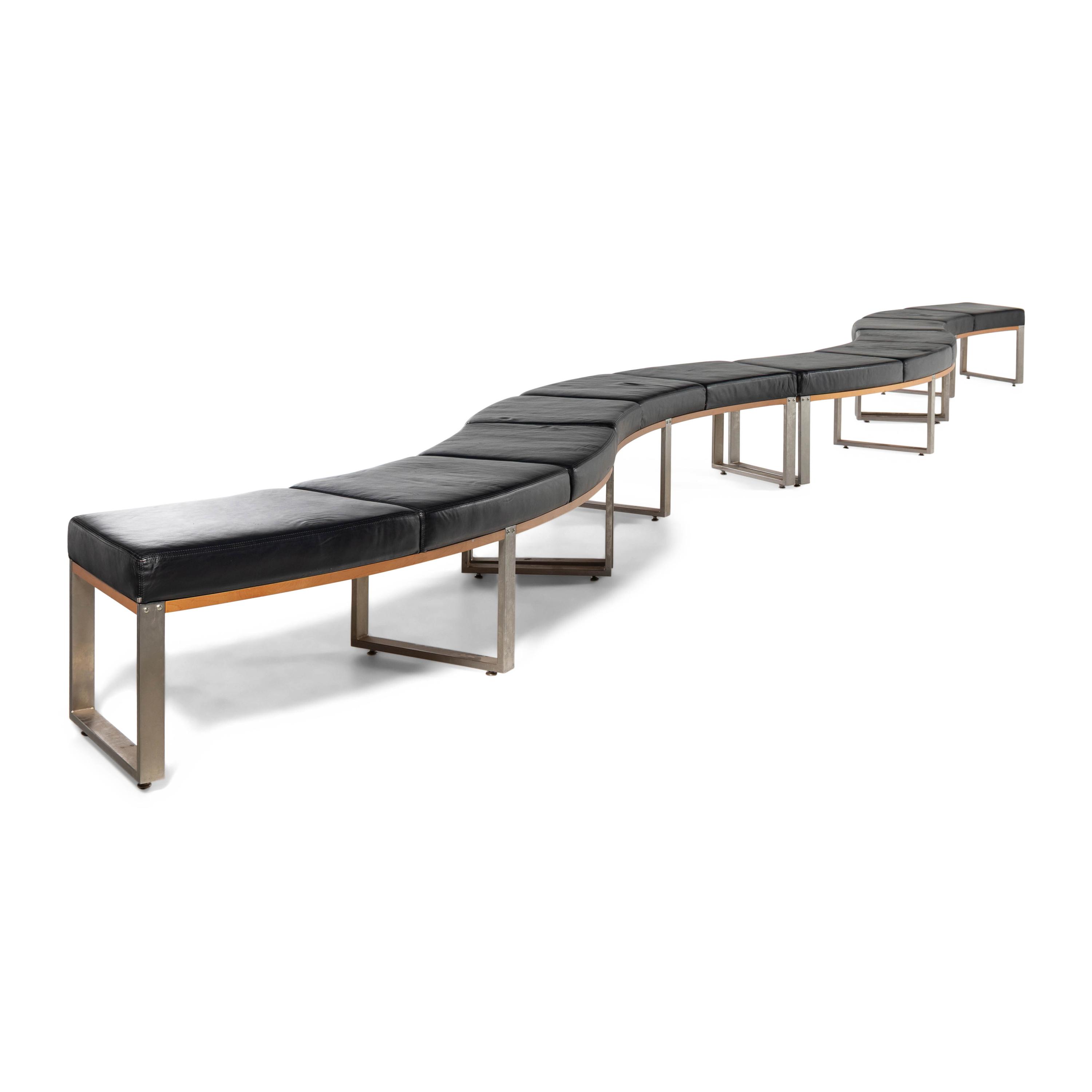 A Leather-Upholstered Elongated Serpentine Bench