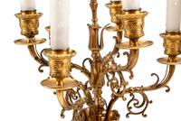 A Pair of French Neoclassical Bronze and Marble Six-Light Candelabra