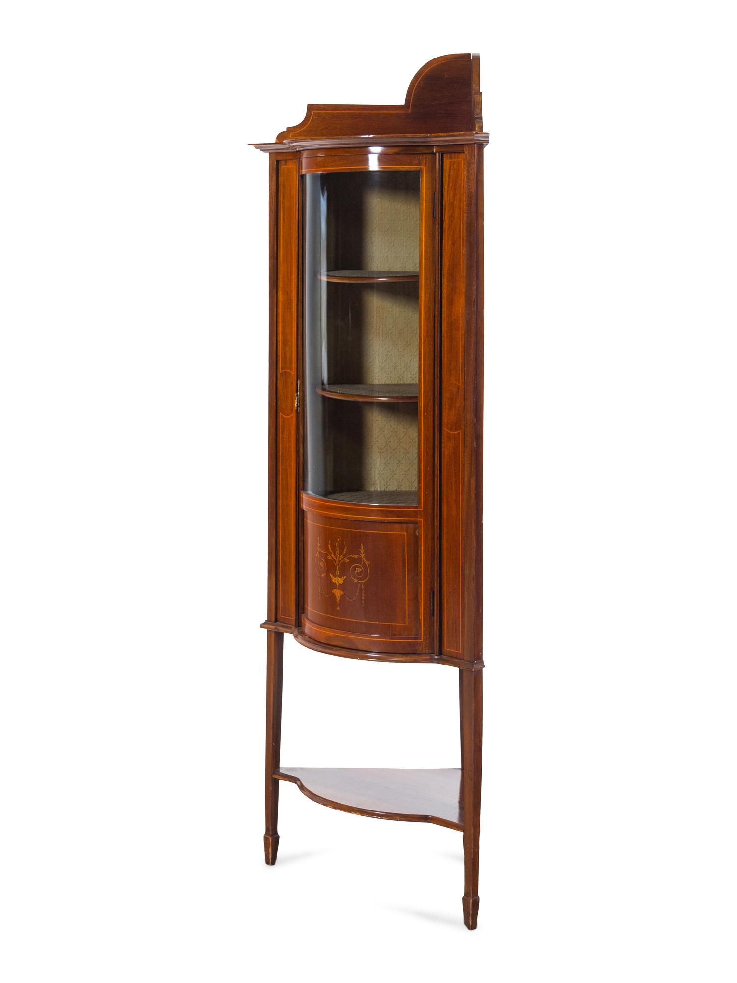 An Edwardian Mahogany and Marquetry Corner Vitrine