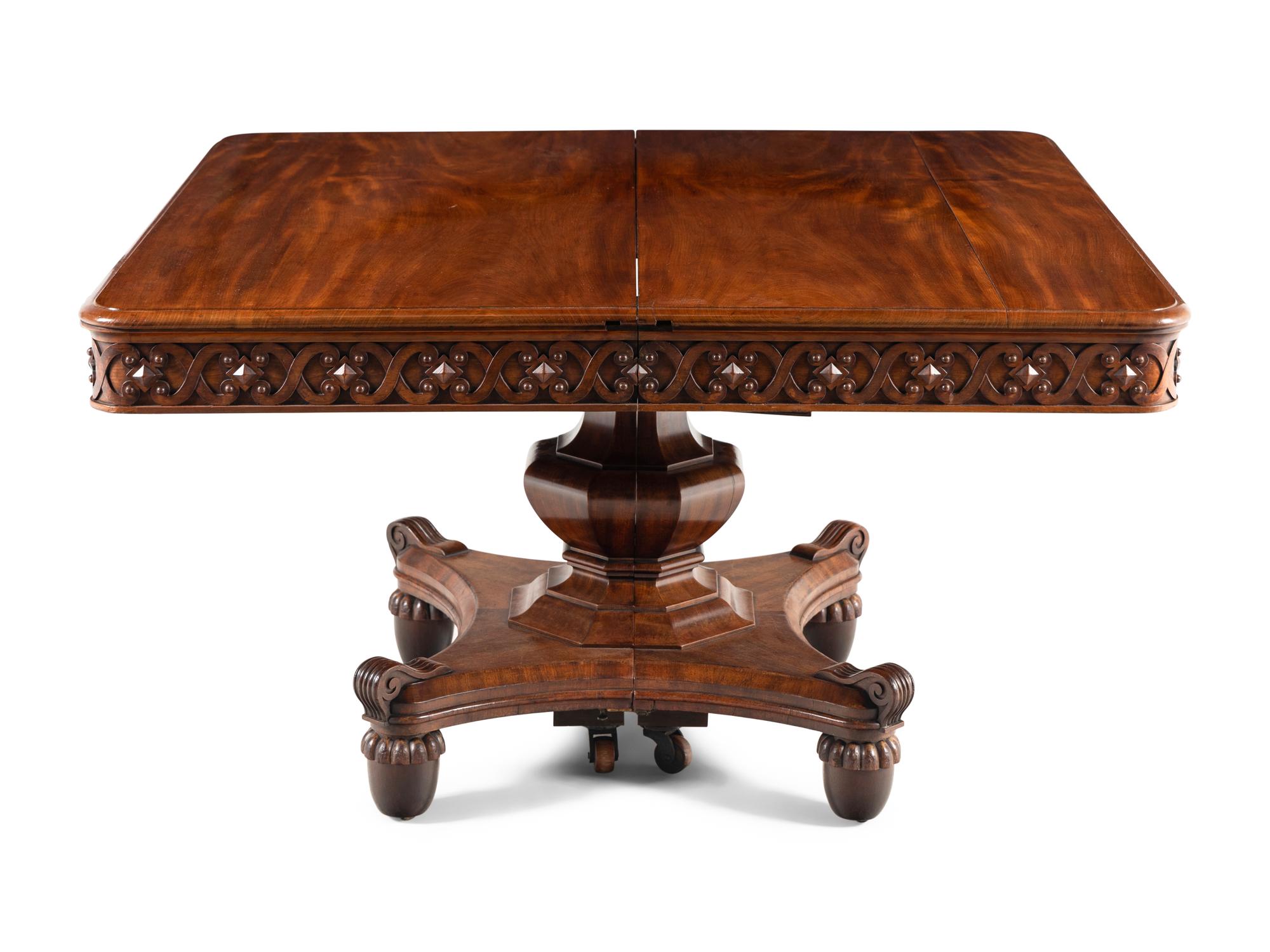 A Renaissance Revival Carved Mahogany Extension Dining Table