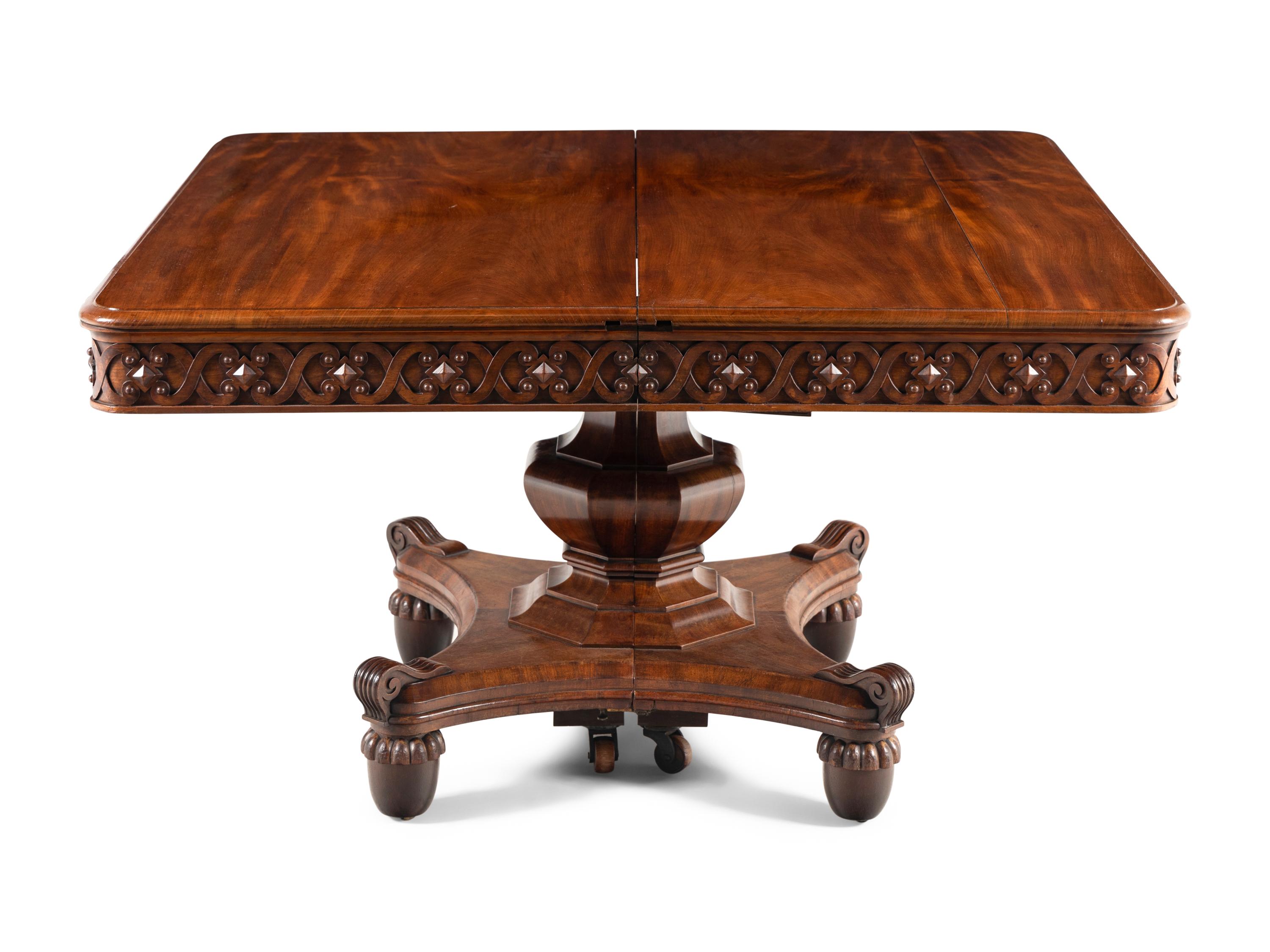 A Renaissance Revival Carved Mahogany Extension Dining Table