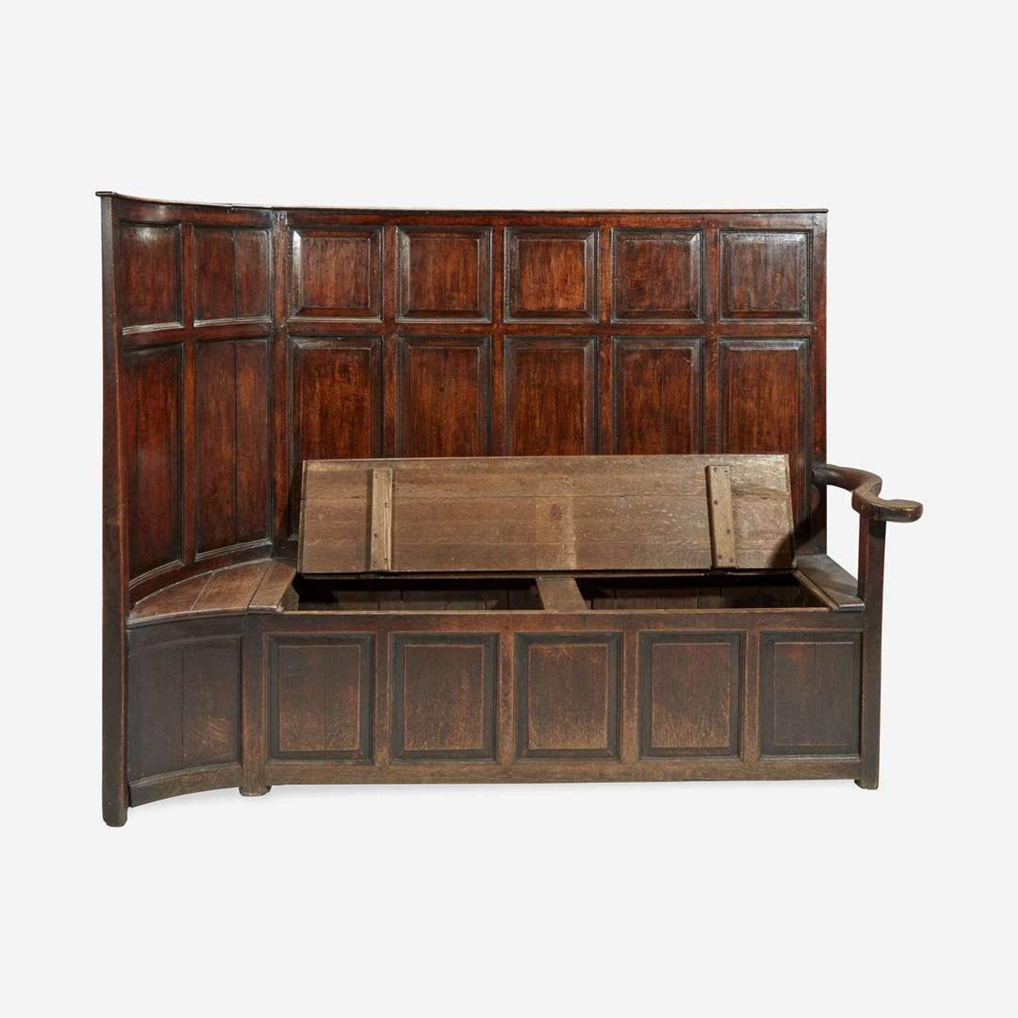 A George II/III Carved Oak Settle Possibly Welsh, 18th century