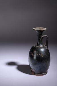 A Greek Black Glazed Lekythos