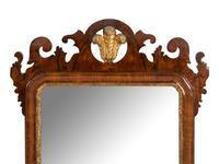 A George III Parcel Gilt Mahogany Mirror