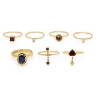 Wendy Ramshaw, Ring Set of Seven Yellow Gold, Garnet, Diamond, and Sapphire Stacking Rings
