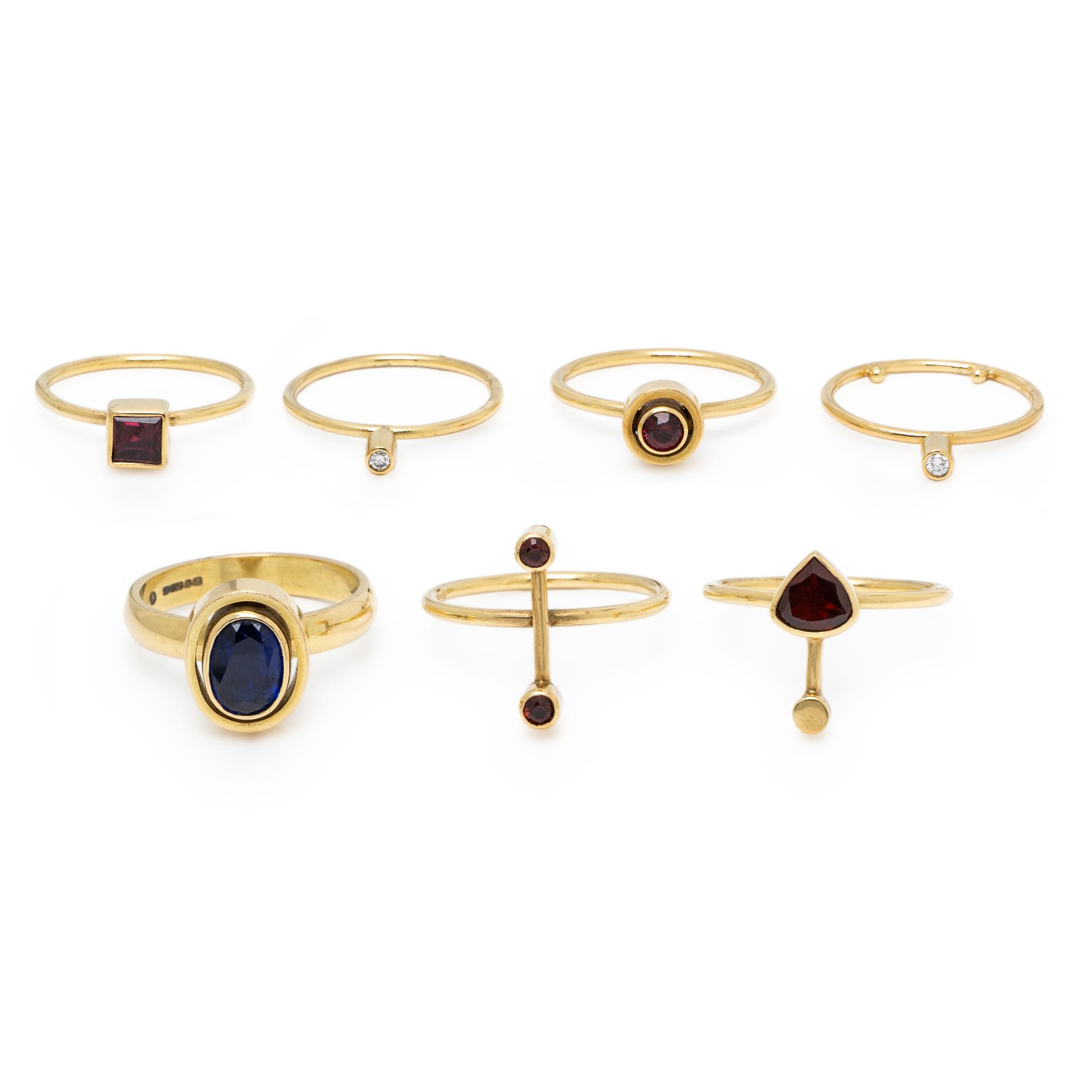 Wendy Ramshaw, Ring Set of Seven Yellow Gold, Garnet, Diamond, and Sapphire Stacking Rings