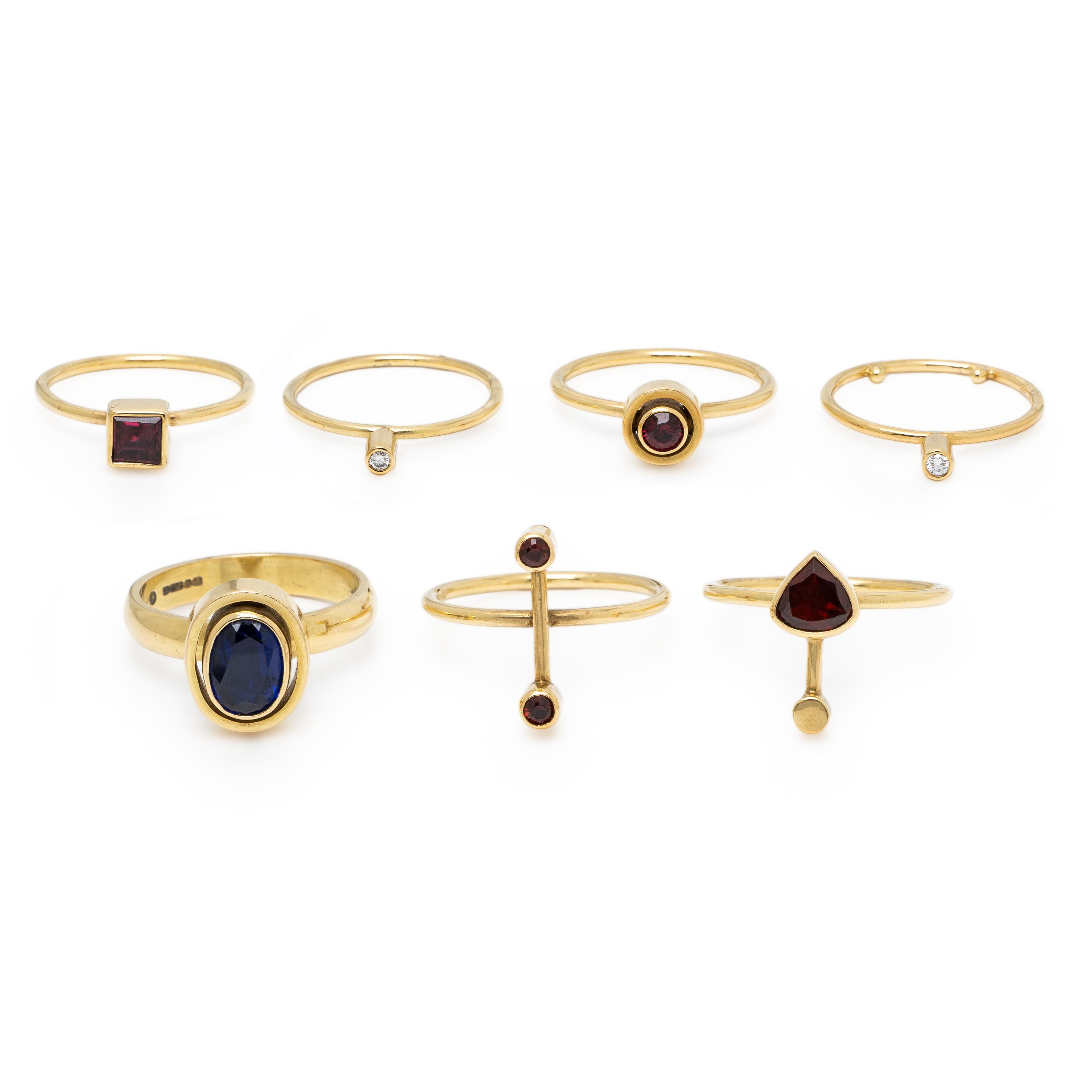 Wendy Ramshaw, Ring Set of Seven Yellow Gold, Garnet, Diamond, and Sapphire Stacking Rings