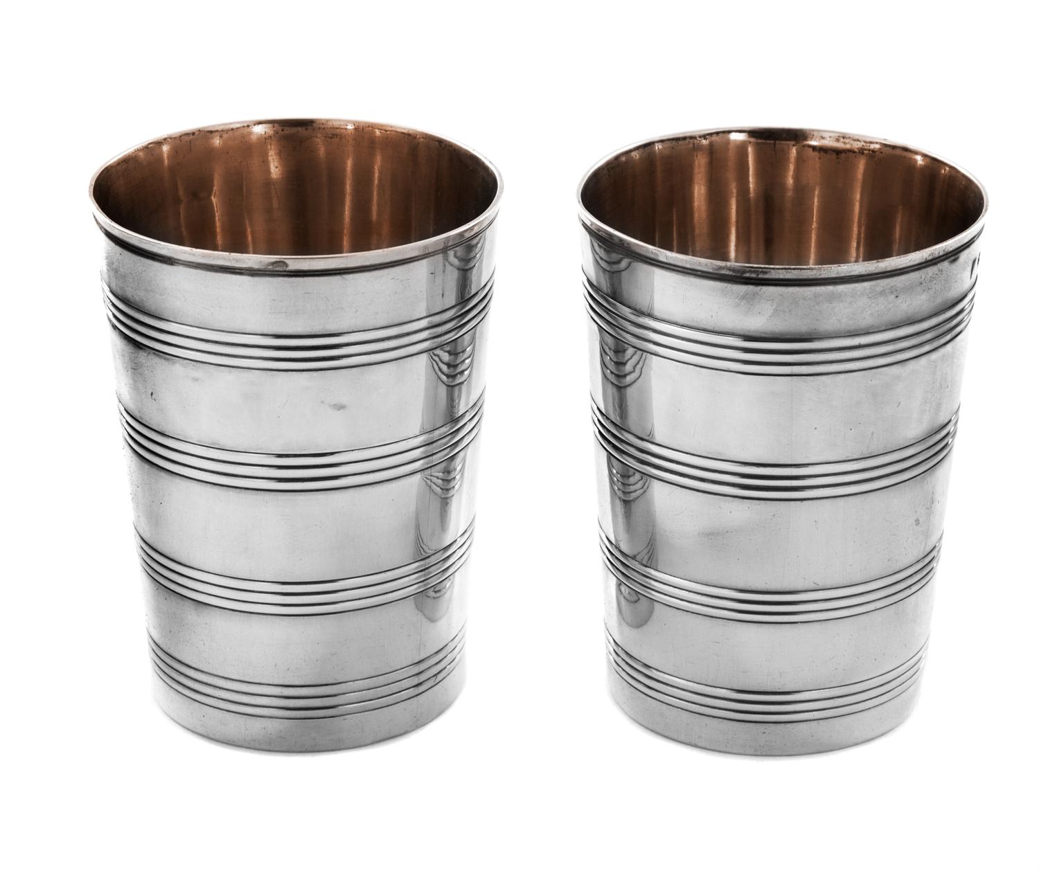 A Pair of George III Silver Beakers, Peter, Ann & William Bateman, London, 1799, each of tapering form with ribbed sides and a gilt int
