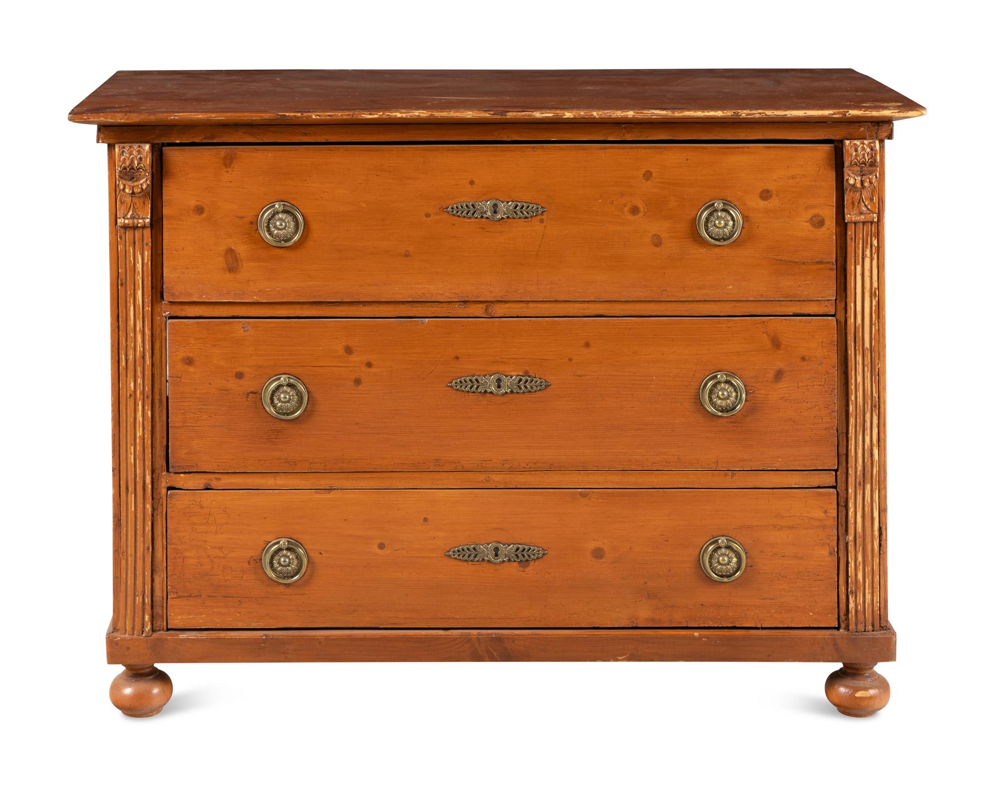 A Continental Grain-Painted Chest of Drawers