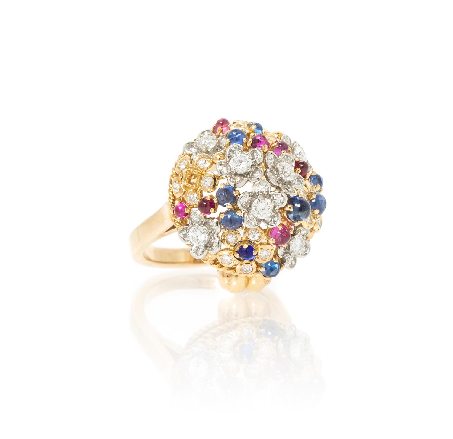 An 18 Karat Gold, Diamond, Sapphire and Pink Sapphire Cluster Ring, 10.00 dwts.