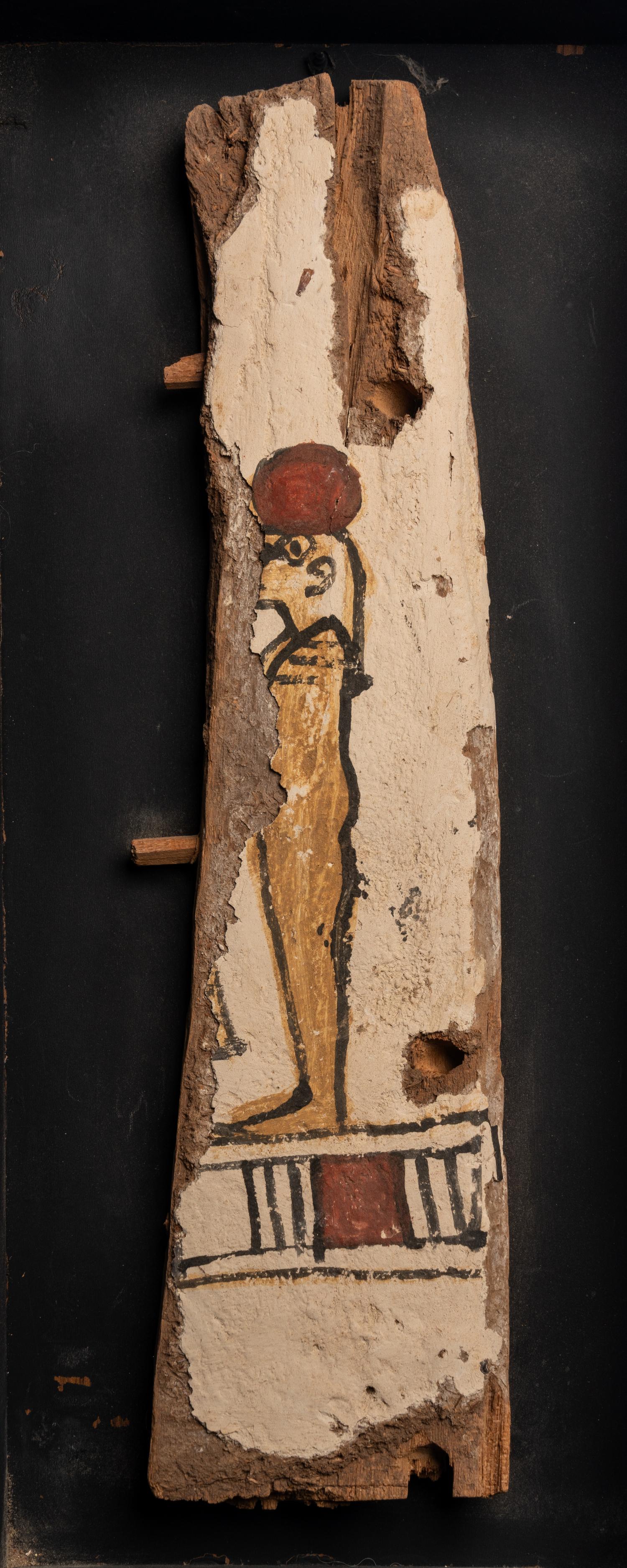 An Egyptian Painted Wood Sarcophagus Fragment