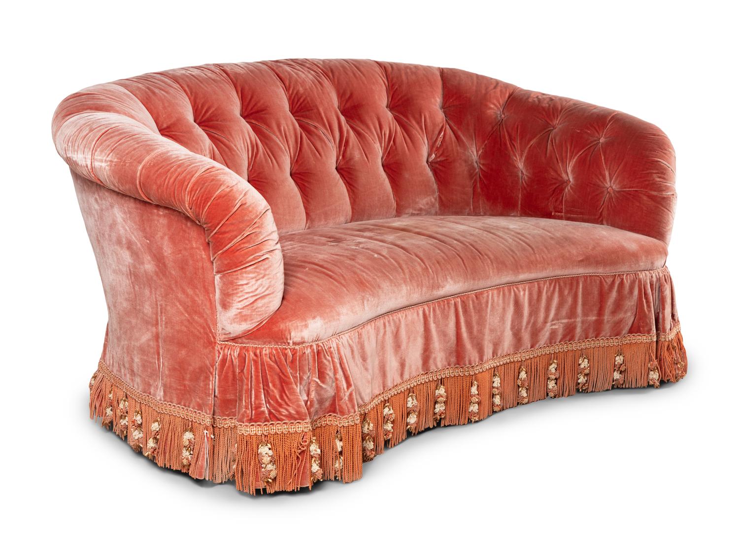 A Button-Tufted Velvet Reniform Sofa