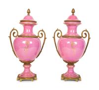 A Pair of French Porcelain Lidded Urns