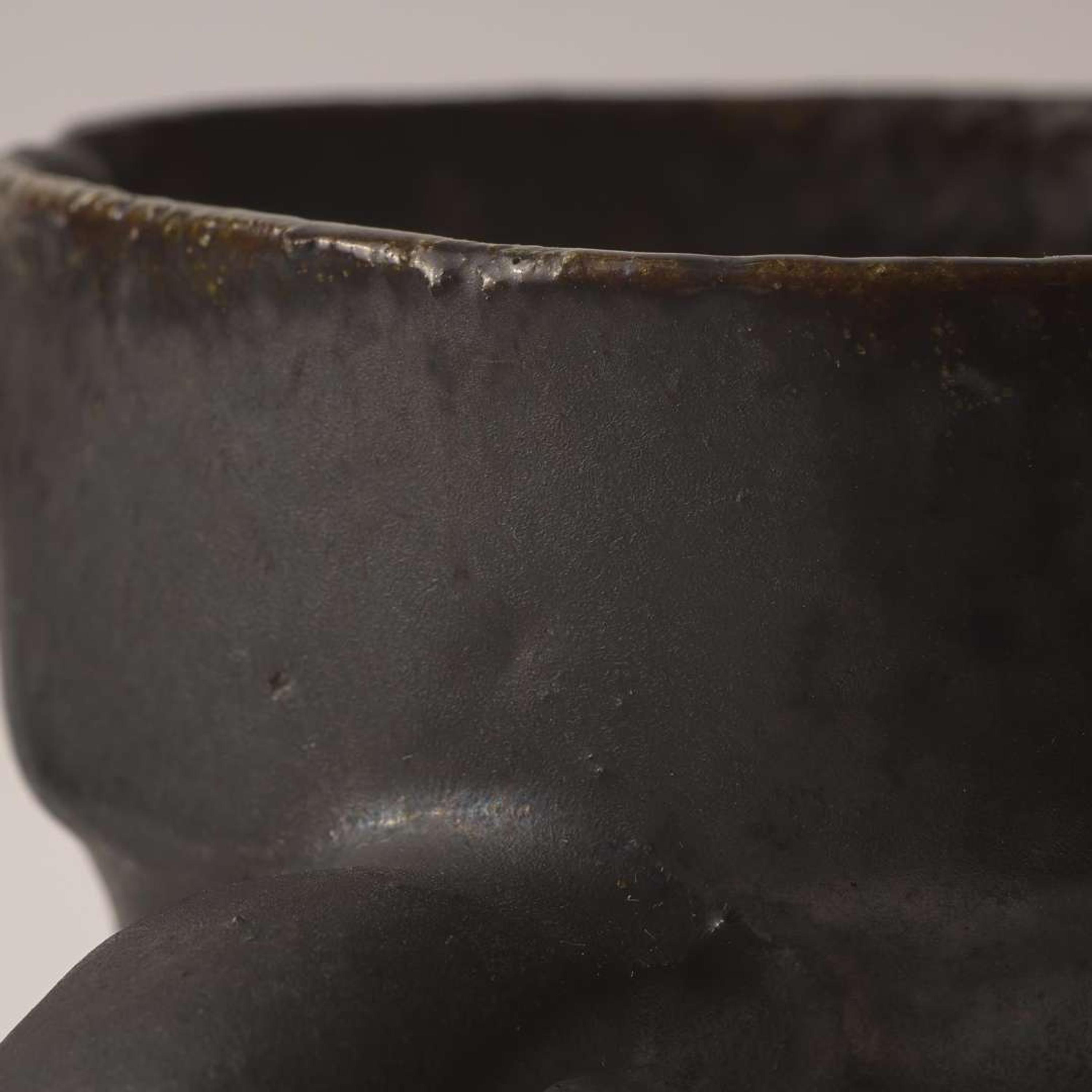 George Ohr (American, 1857-1918) Three-Handled Mug in Matte Gunmetal Glaze with Streaky Olive Interior, Biloxi, Mississippi, USA, circa 1898-1910