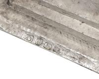 An Assembled Set of George III Sterling Silver Candlesticks