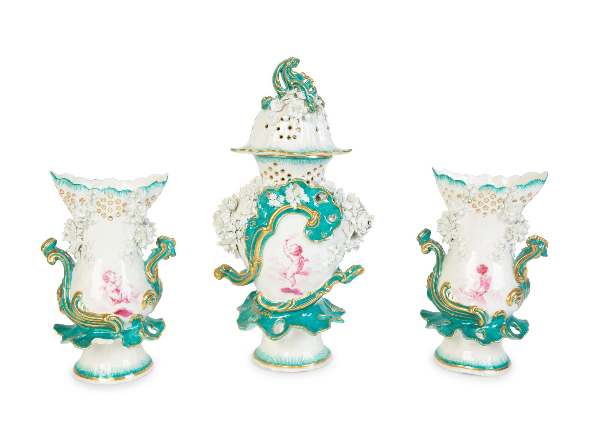 A Continental Porcelain Garniture Set — 19TH CENTURY