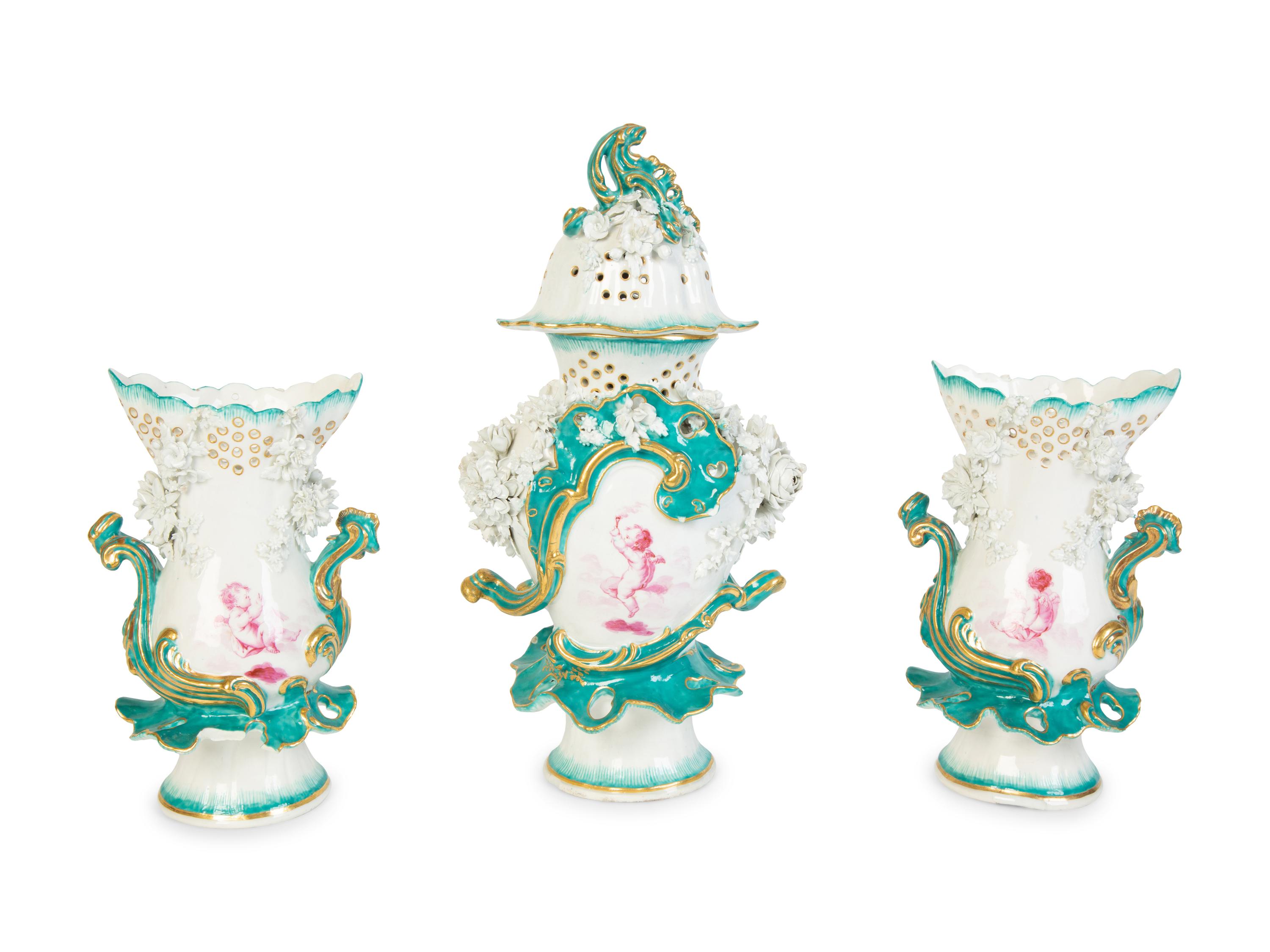 A Continental Porcelain Garniture Set — 19TH CENTURY