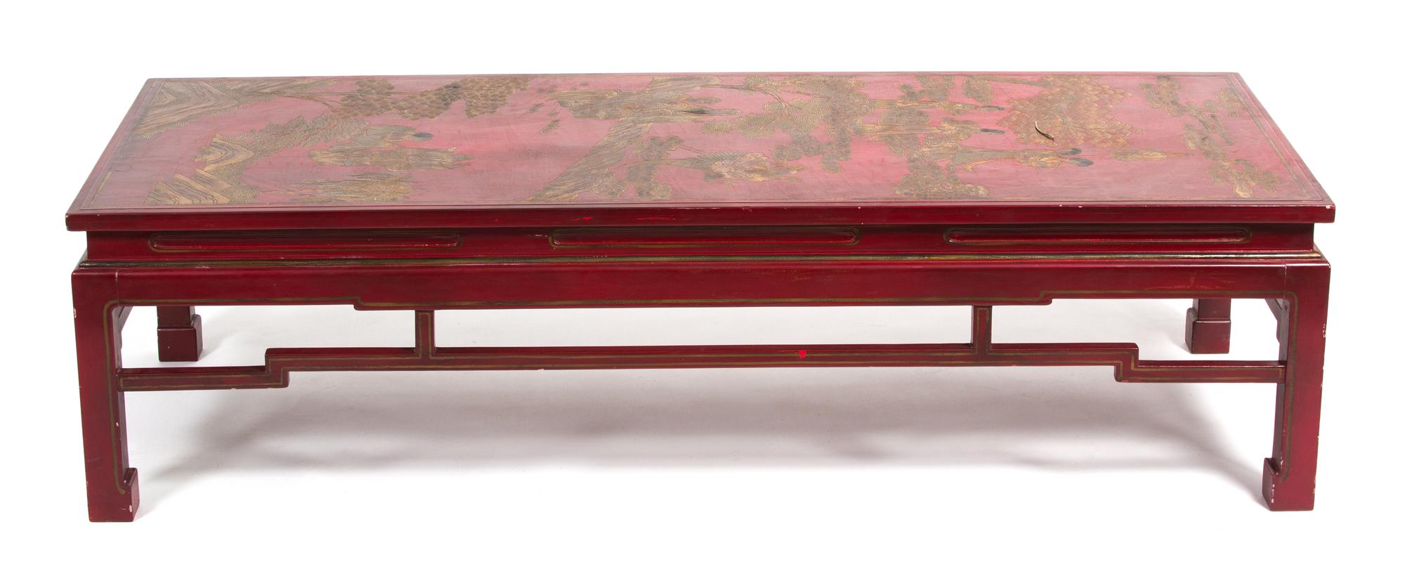 A Chinese Red and Gold Lacquered Low Table Height 15 1/2 x width 59 x depth 23 1/2 inches — 20TH CENTURY