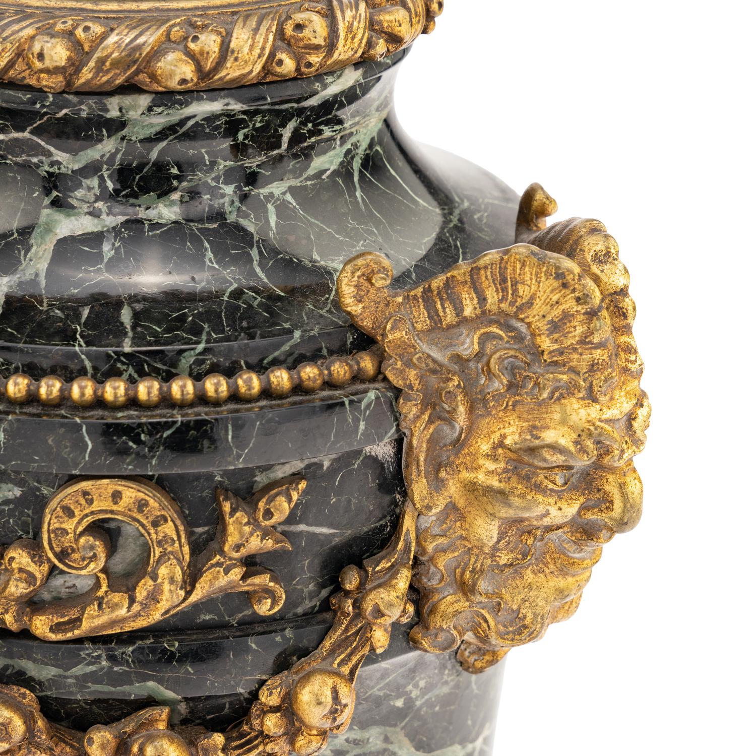 A Pair of French Gilt Bronze Mounted Verde Antico Marble Urns