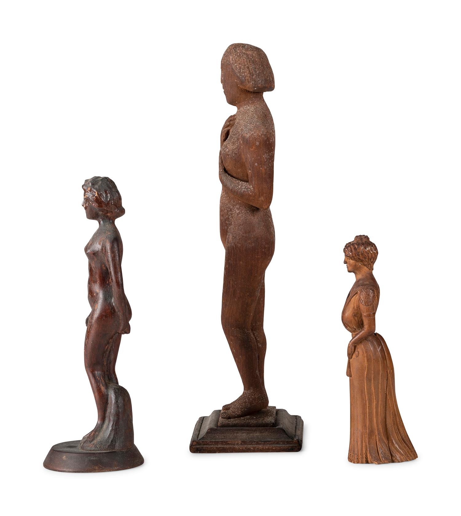 Three Carved Wooden Standing Female Figures