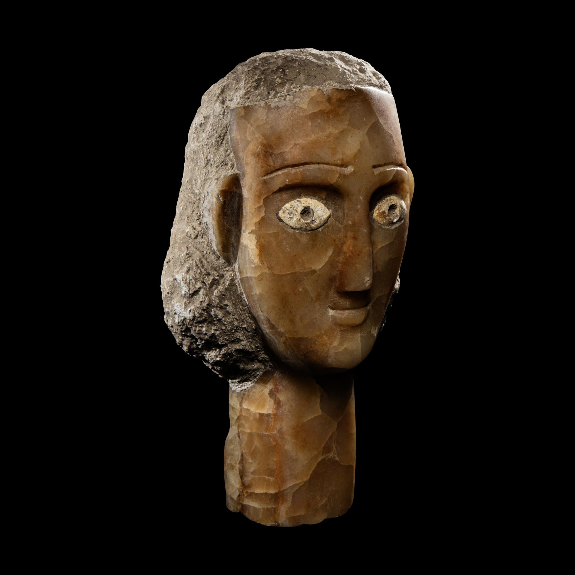 A South Arabian Alabaster Head of a Woman