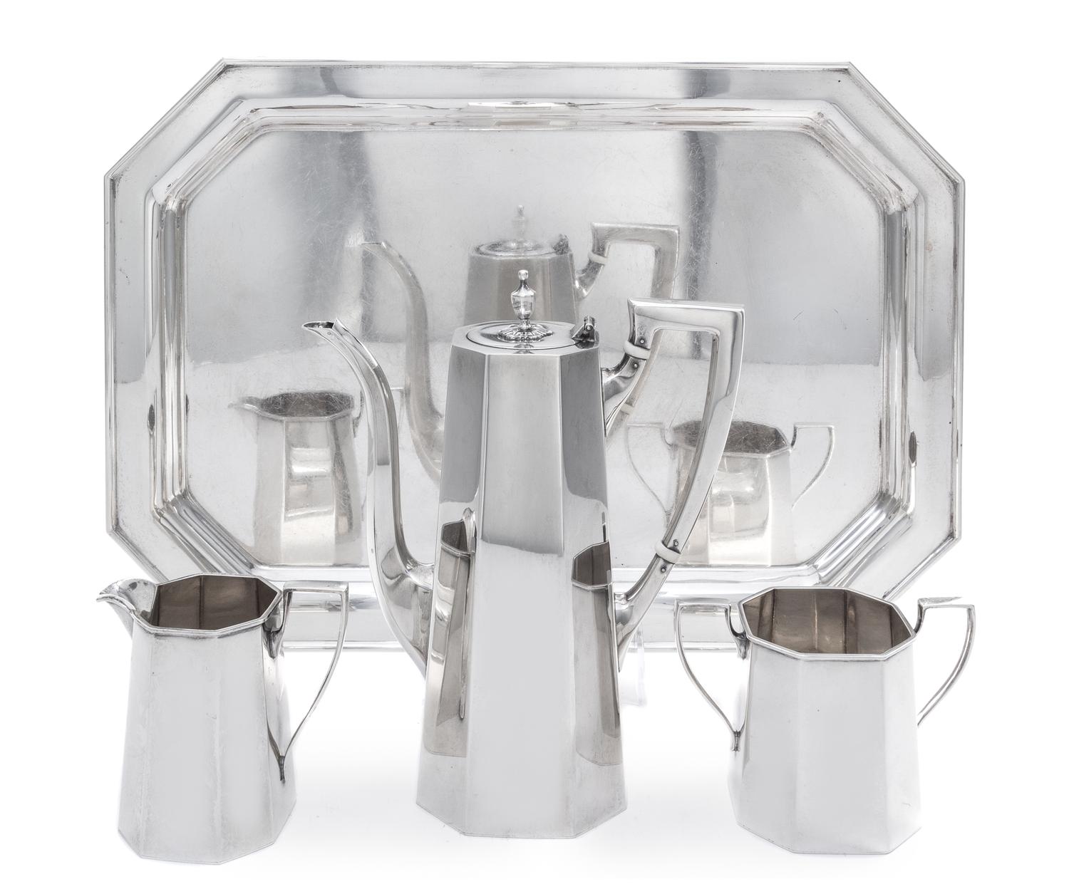 An American Silver Four-Piece Coffee Service, Redlich & Company, New York, NY, retailed by Cartier, comprising a coffee pot, a creamer,
