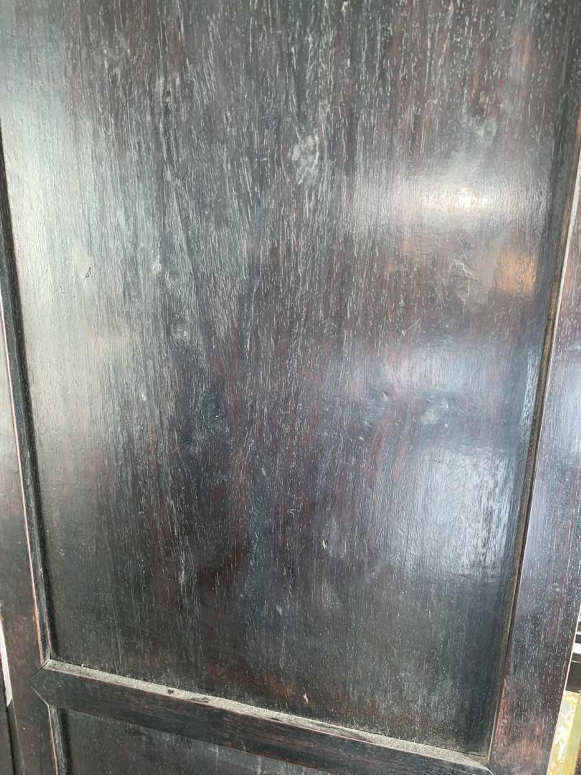 A Chinese carved hardwood six-panel “Dragons” screen 硬木浮雕龙纹六开屏风