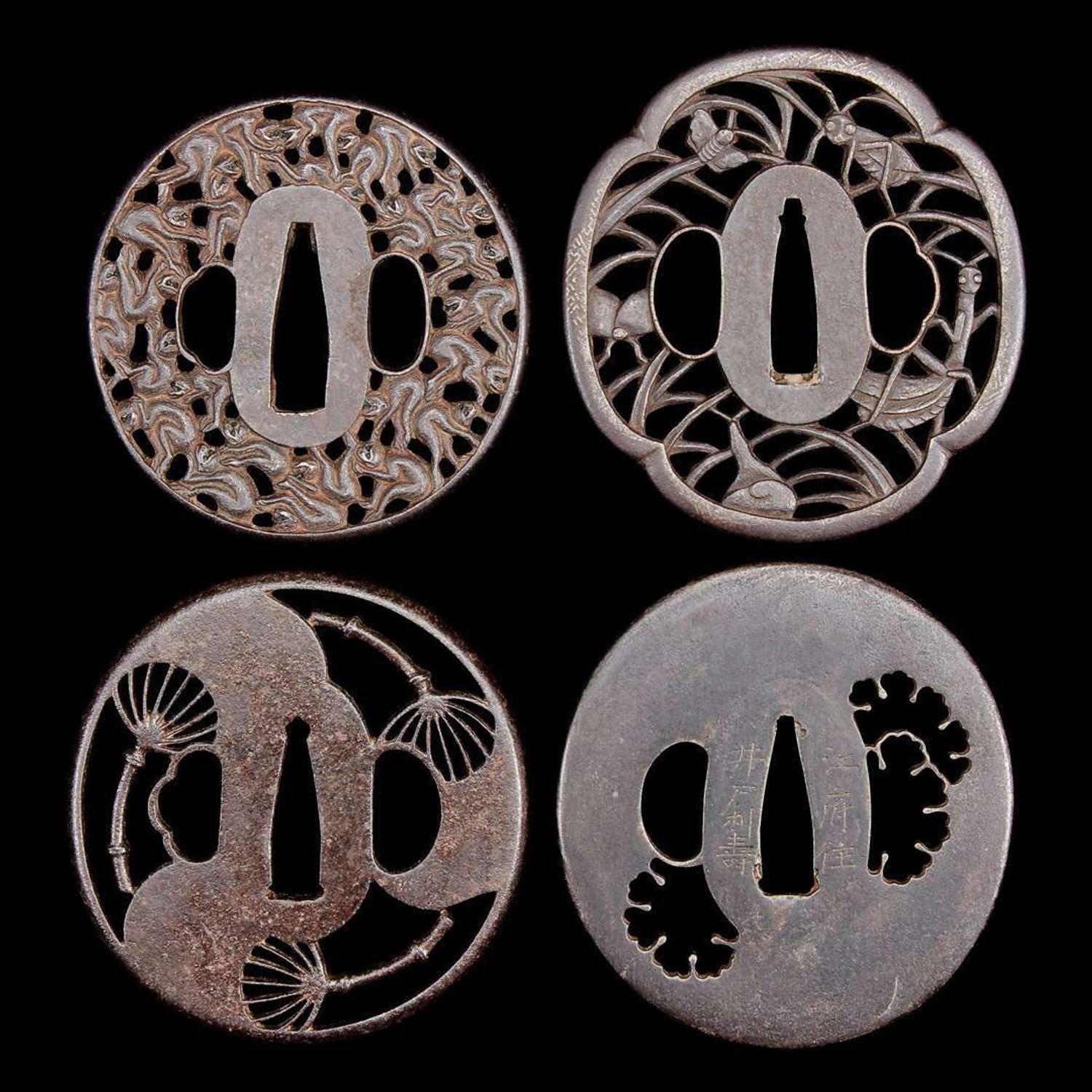 A group of eight Japanese pierced iron and metal tsuba 刀镡一组八件 Edo period ??
