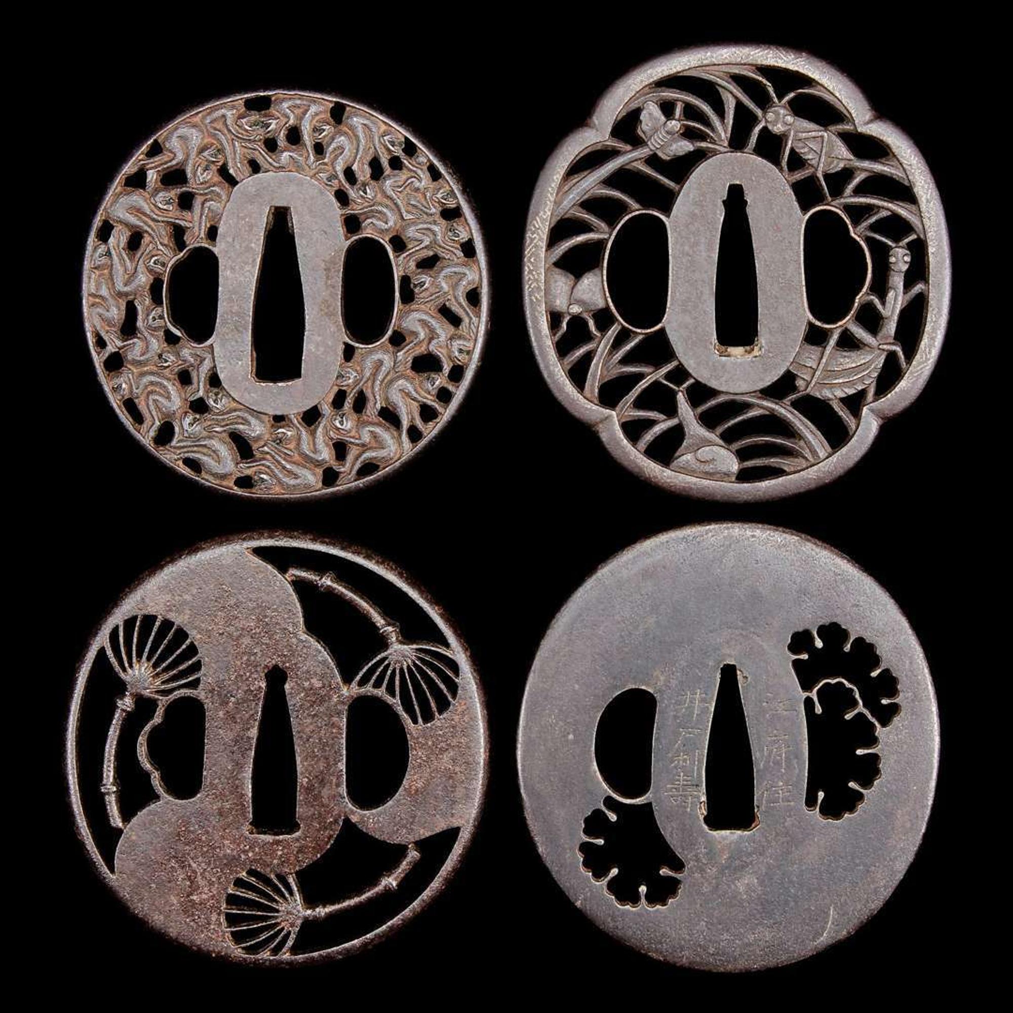 A group of eight Japanese pierced iron and metal tsuba 刀镡一组八件 Edo period ??