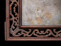 A Chinese Greyish White Jade Inset Hardwood Mounted Panel