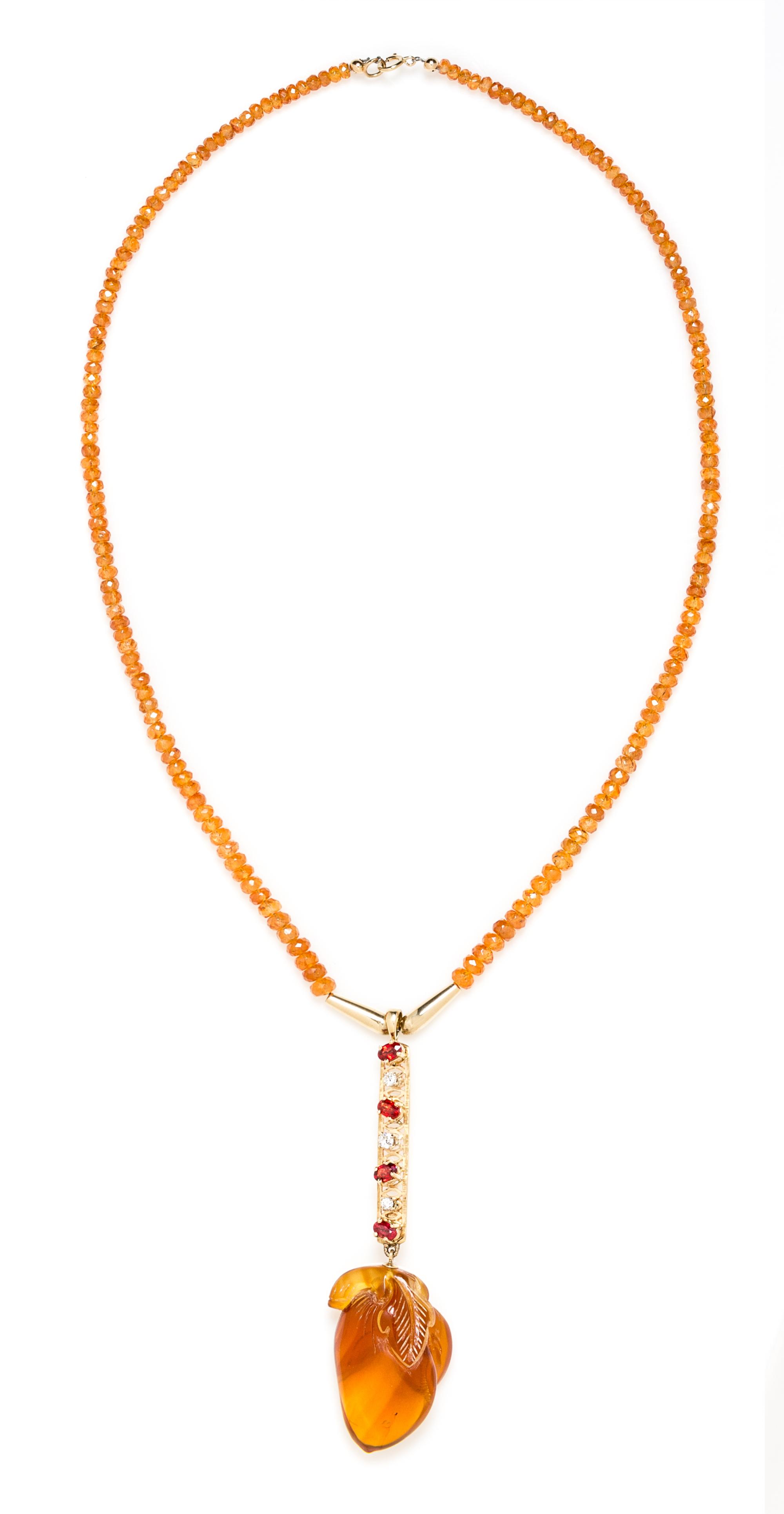 A 14 Karat Yellow Gold, Spessartite Garnet, Amber and Diamond Lavalier Necklace, 18.60 dwts.