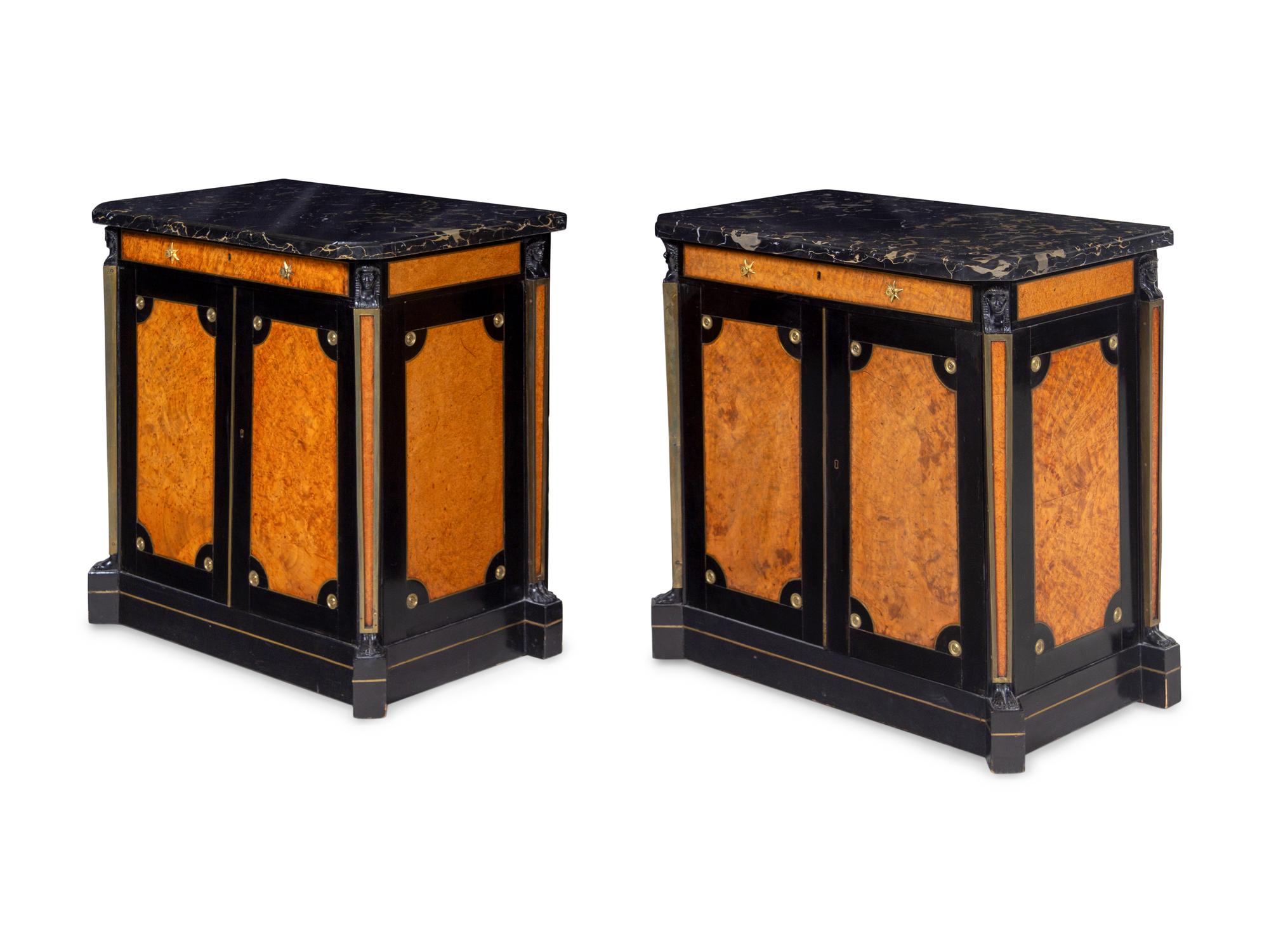A Pair of Russian Empire Gilt Metal Mounted Ebonized and Burlwood Marble-Top Side Cabinets