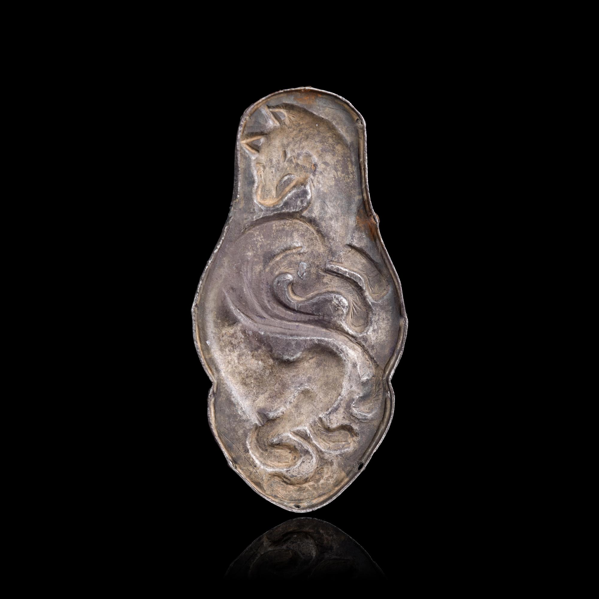 A Chinese Silver 'Winged Fox' Harness Ornament, Northeast China, Xianbei Tribe, Han-Jin Dynasty 汉-晉 鲜卑“飛狐”銀馬珂