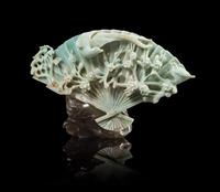 A Chinese Apple Green and Celadon Jadeite Fan-Form Carving
