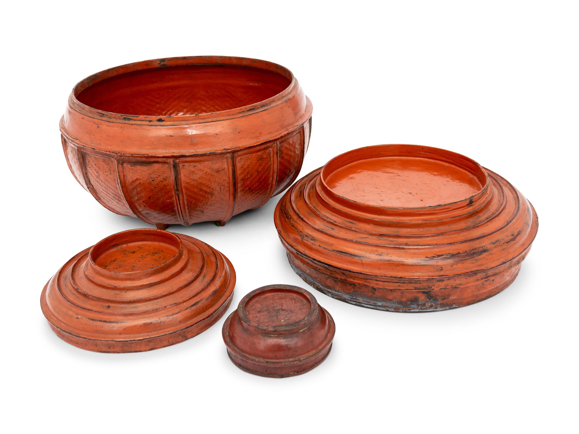 A Group of Six Southeast Asian Red Lacquer Articles