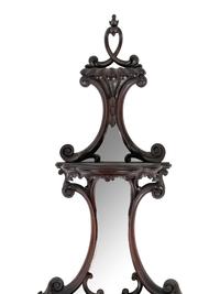A Pair of George III Style Mirrored and Carved Mahogany Wall Brackets
