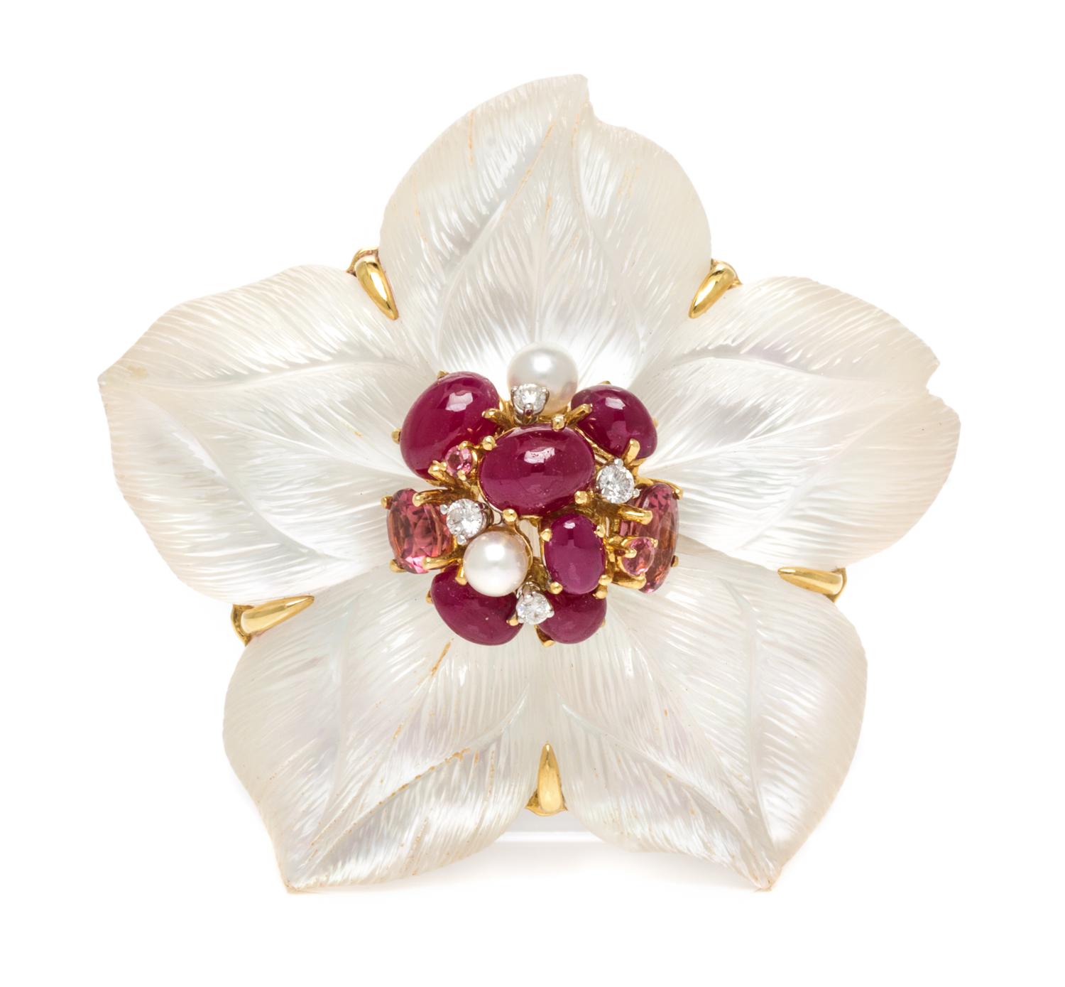 An 18 Karat Yellow Gold, Rock Crystal, Diamond and Multigem Clematis Brooch, Seaman Schepps, 38.10 dwts.