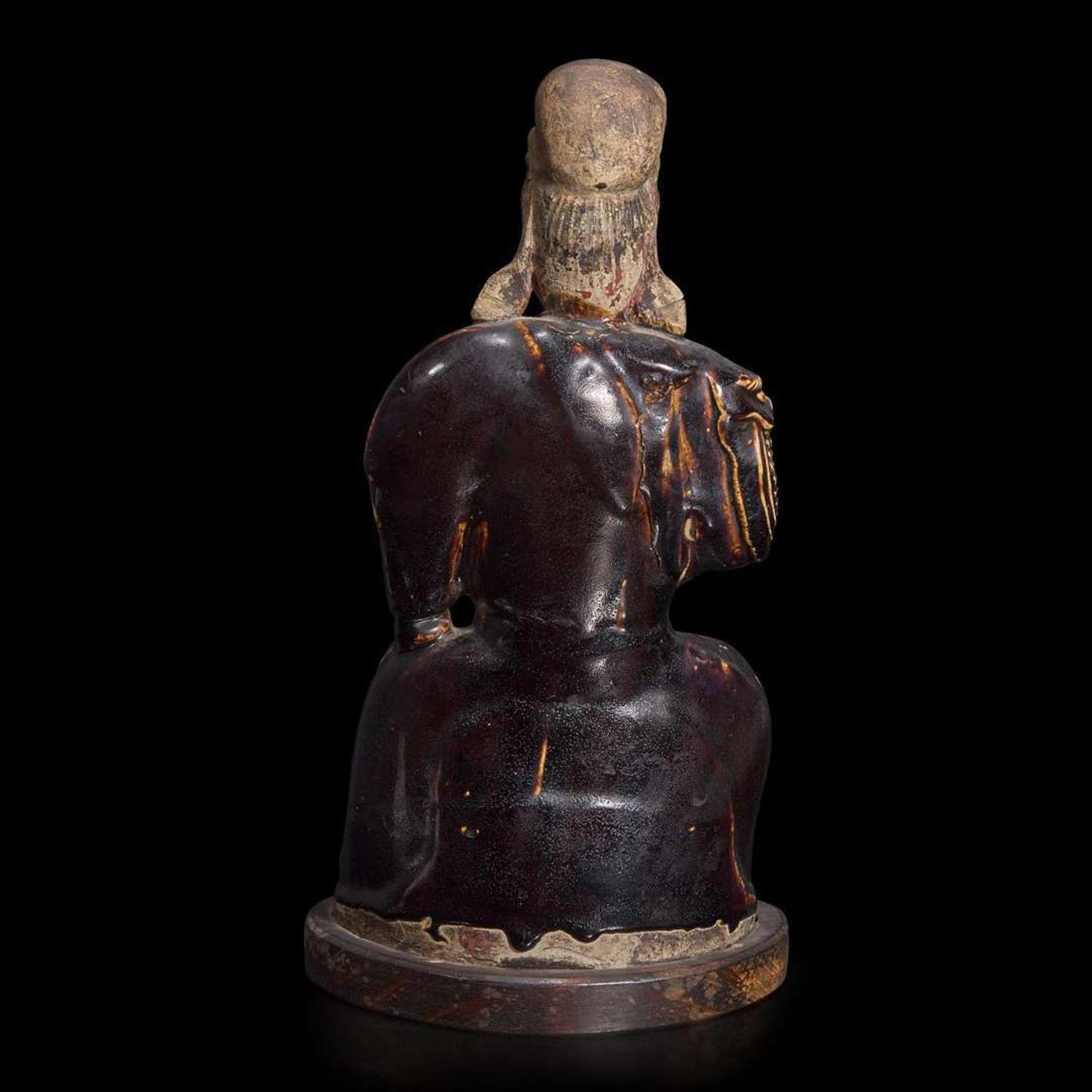 A Chinese brown glazed figure of Guandi 关帝像 Ming dynasty ?