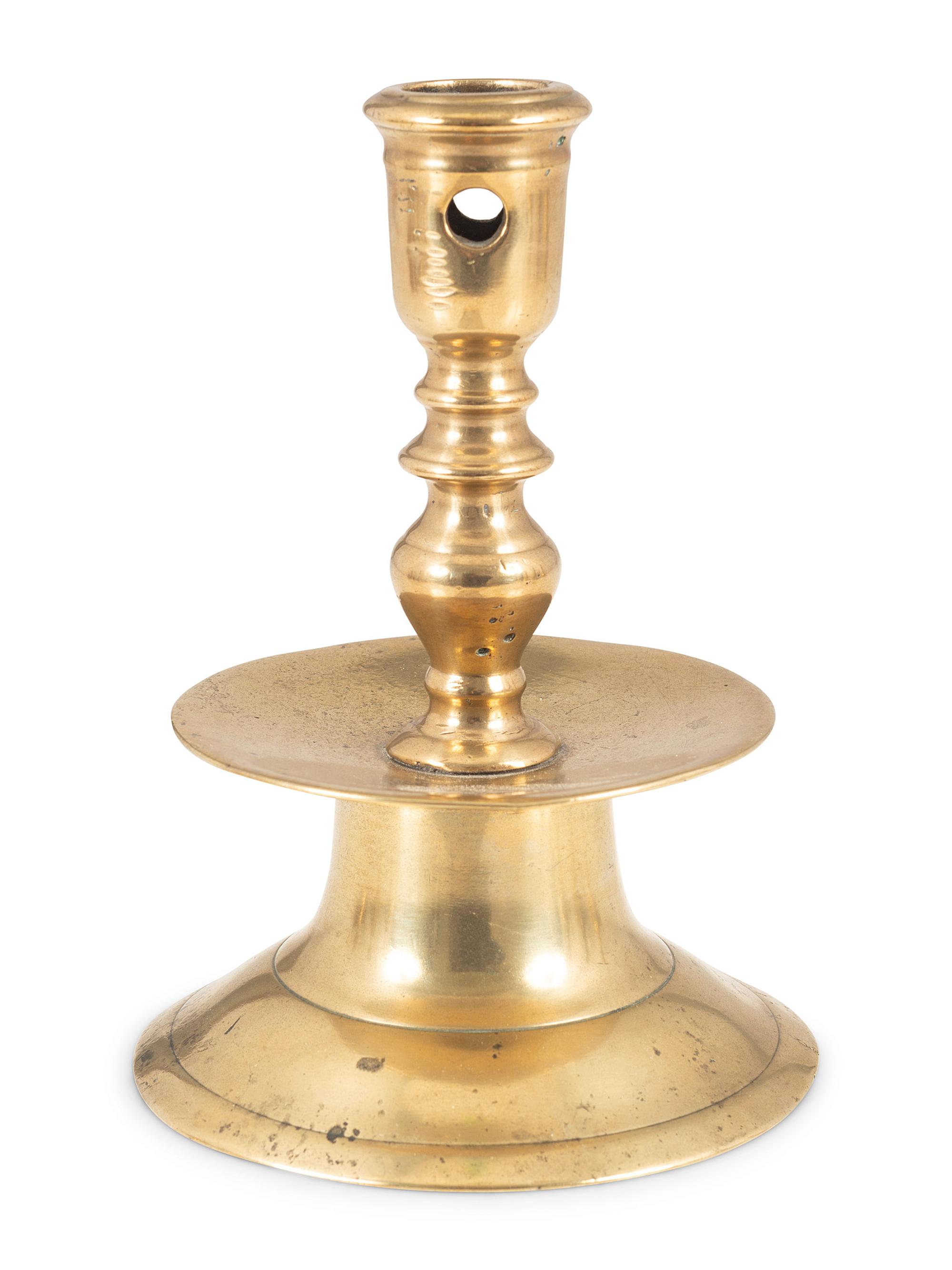 A Continental Brass Heemskirk Candlestick