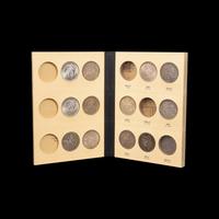 A Collection of Seventy Morgan Silver Dollars