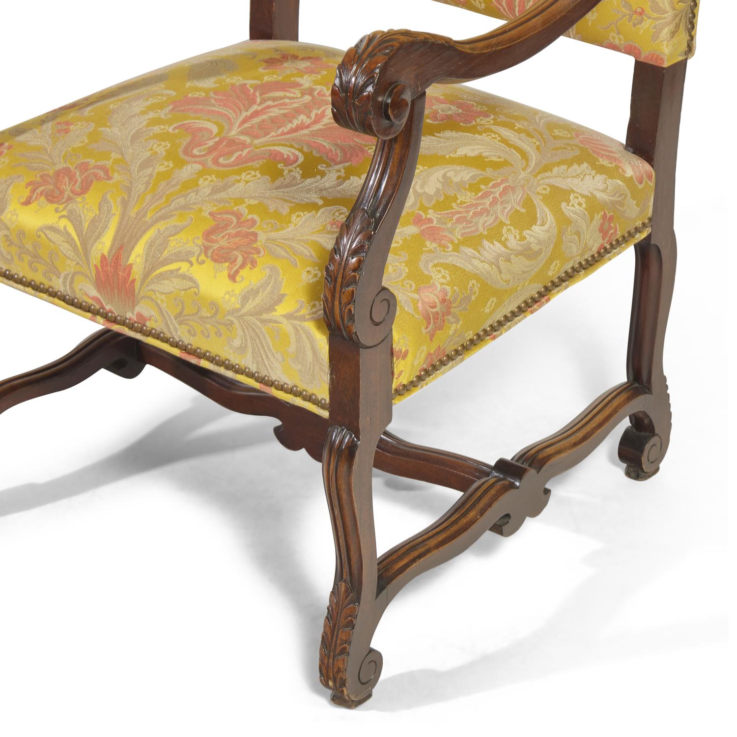 A Pair of Louis XIV Style Carved Mahogany Fauteuils