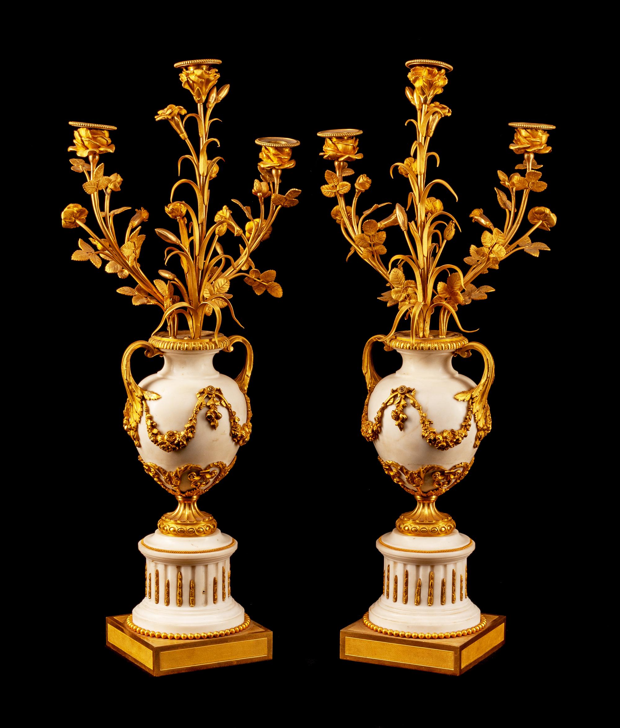 A Pair of Louis XV Style Gilt Bronze and Marble Three-Light Candelabra