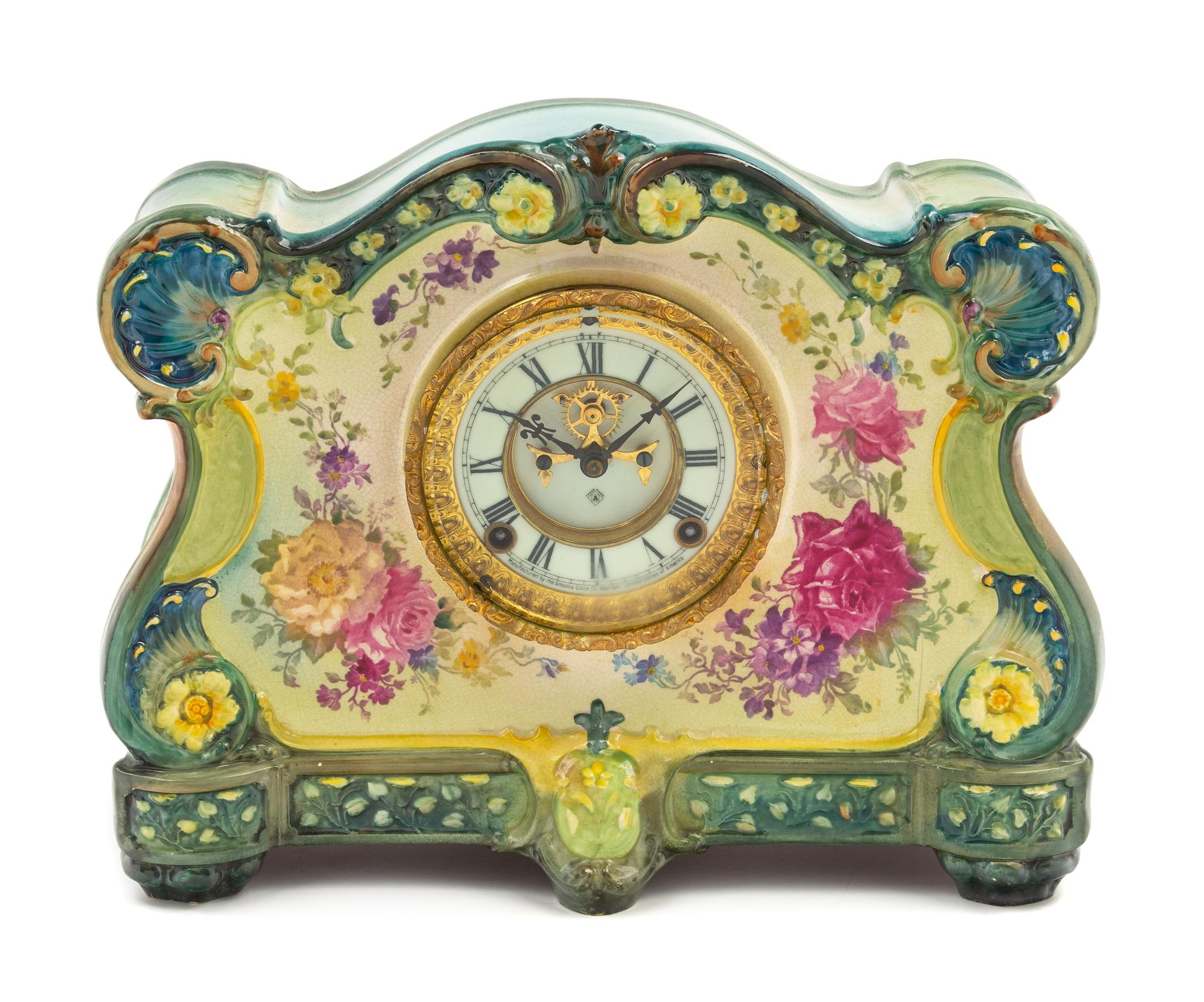 A Royal Bonn Porcelain Mantel Clock Height 11 1/2 x width 14 x depth 4 1/2 inches. — MOVEMENT BY ANSONIA, LATE 19TH CENTURY