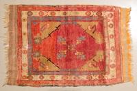 A Persian Wool Mat 2 feet 10 inches x 2 feet 8 inches.