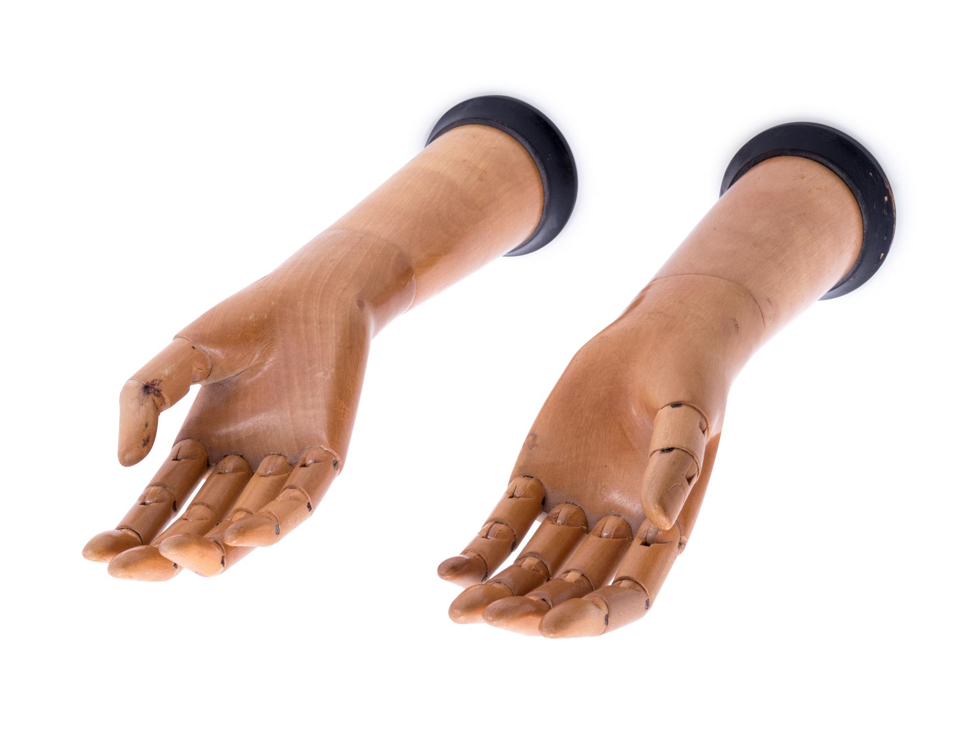 A Pair of French Carved and Articulated Wood Glove Molds