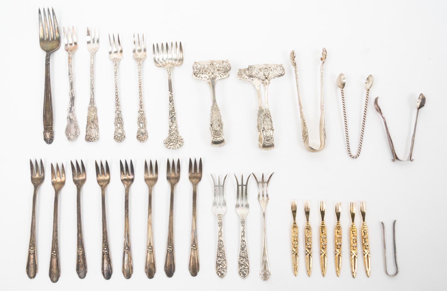 A Group of Silver-Plate Flatware Servers Length of longest 13 1/2 inches.