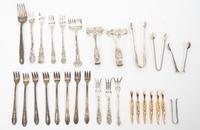A Group of Silver-Plate Flatware Servers Length of longest 13 1/2 inches.