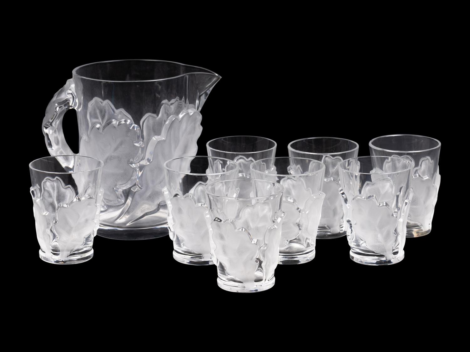 A Lalique Chene Pitcher and Eight Glasses